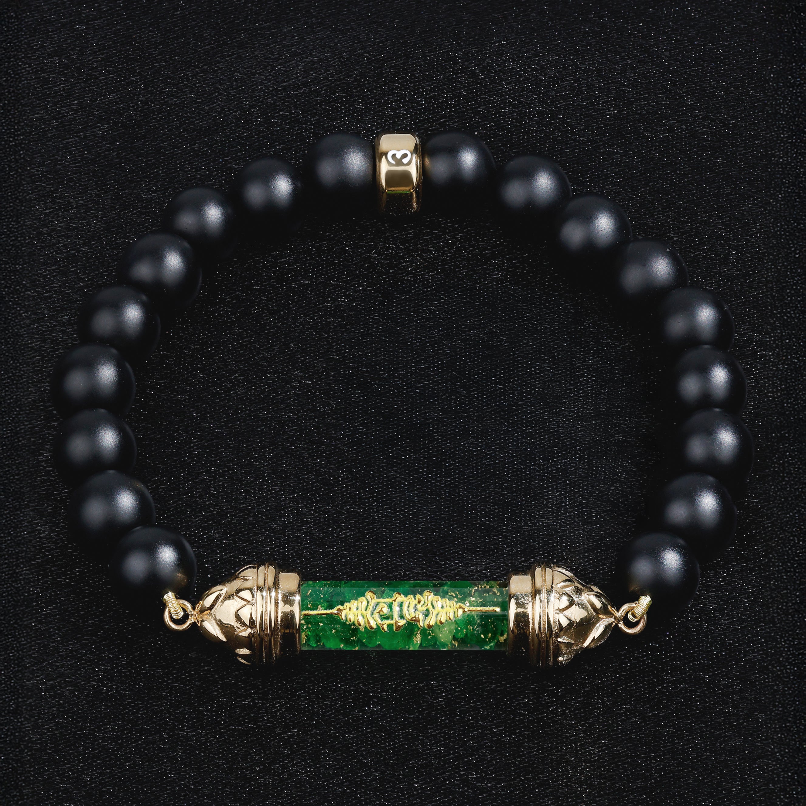 Onyx bracelet with sacred Tsavorite amulet