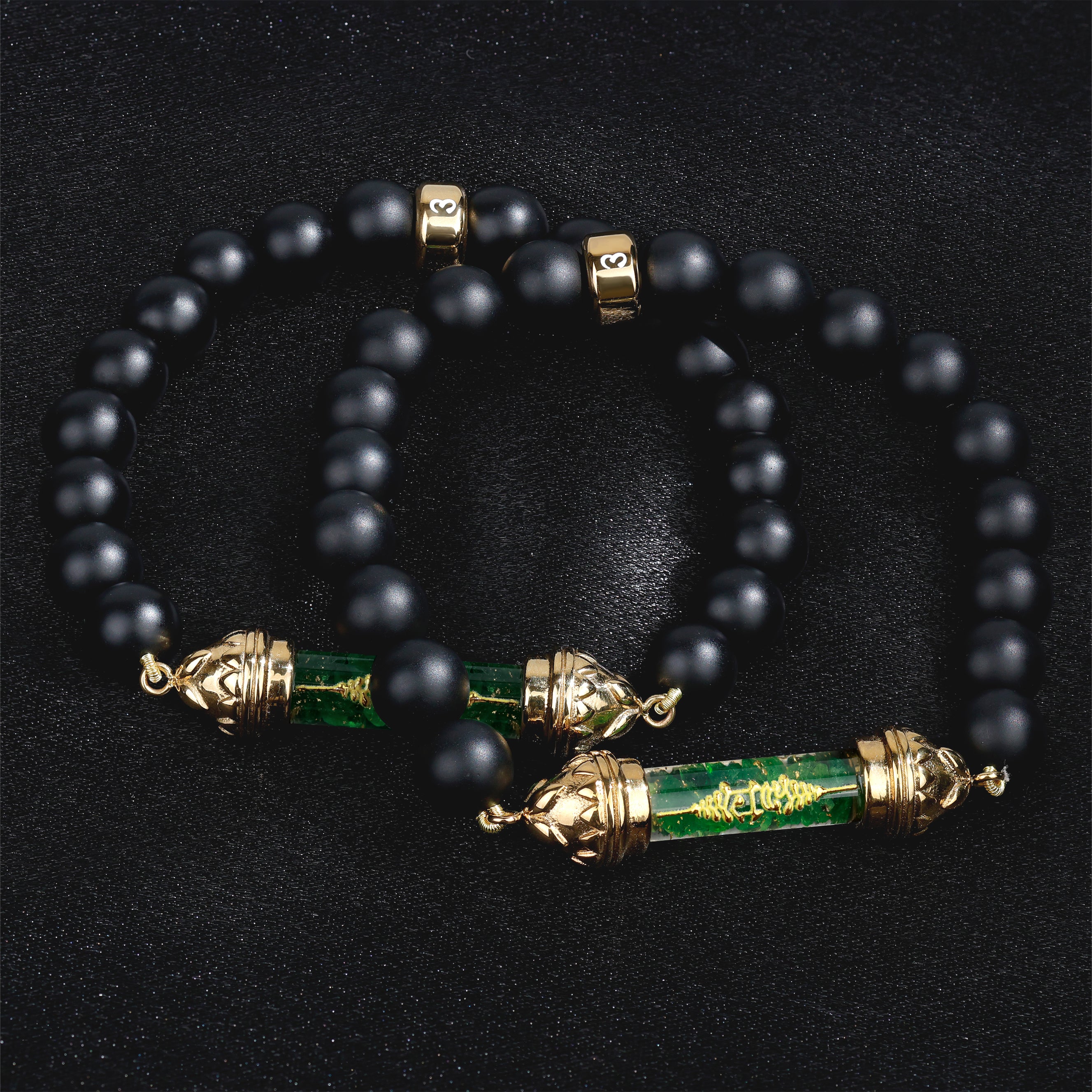 Onyx bracelet with sacred Tsavorite amulet