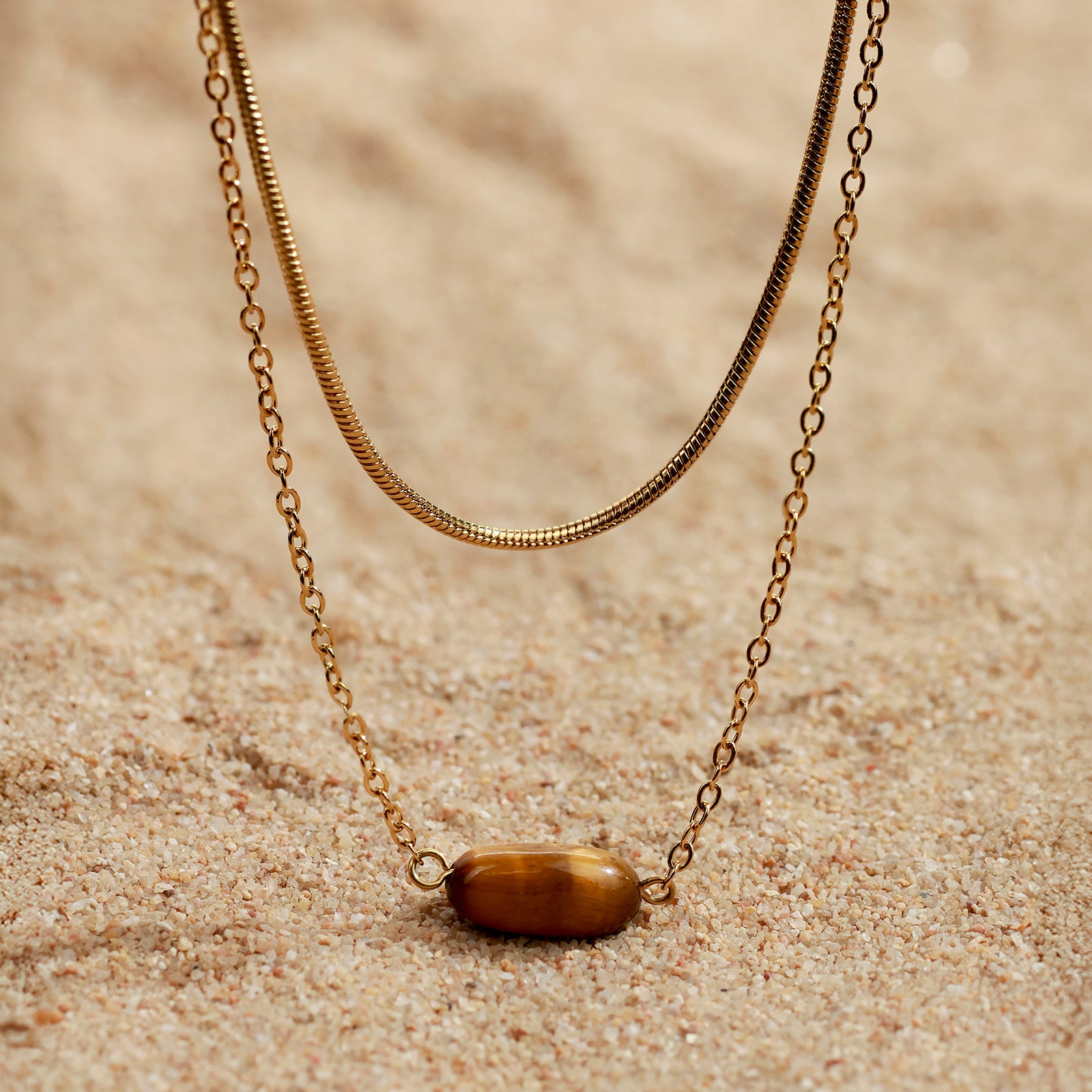 Collier Strata Tiger – Double chaîne & œil de tigre galet