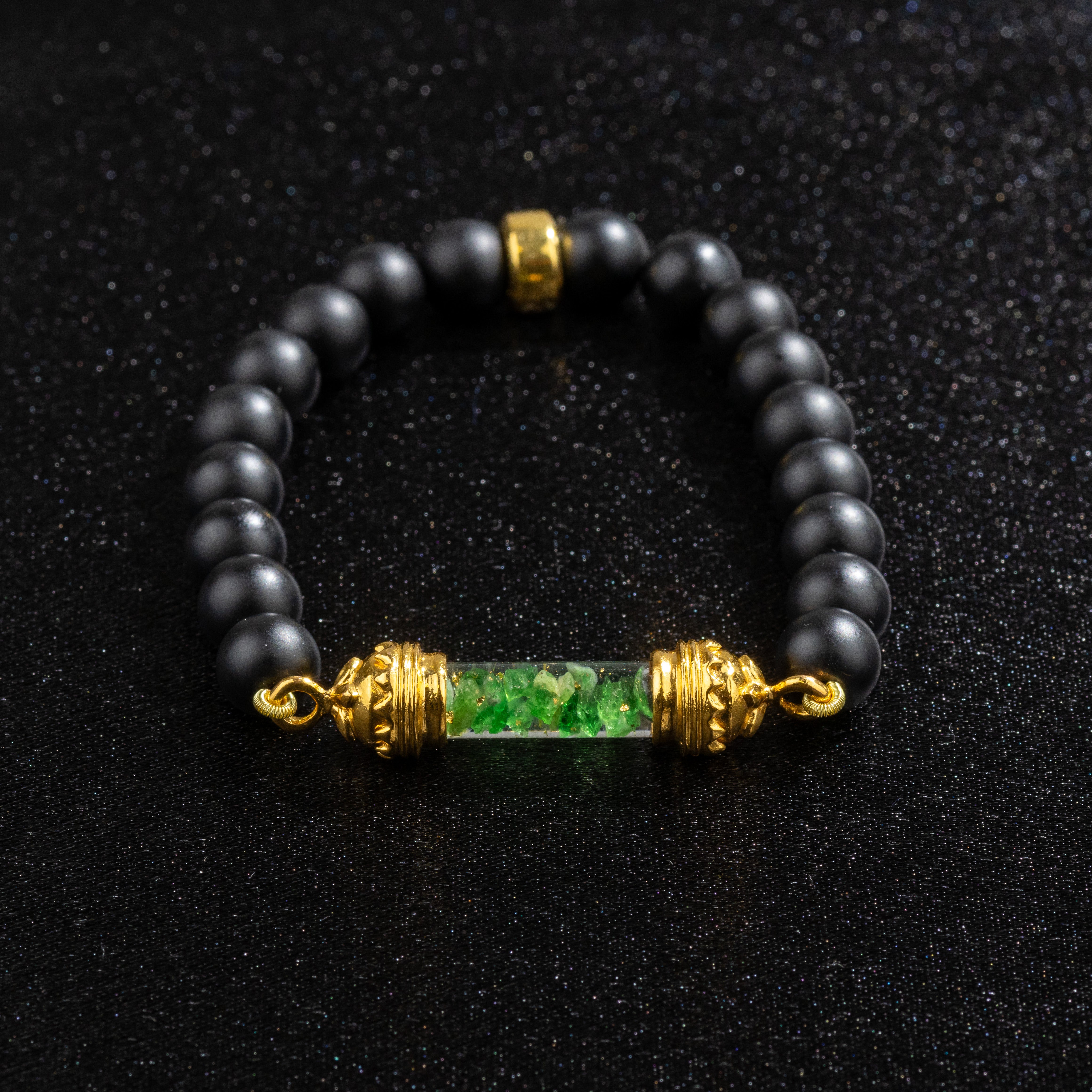 Onyx bracelet with sacred Tsavorite amulet 